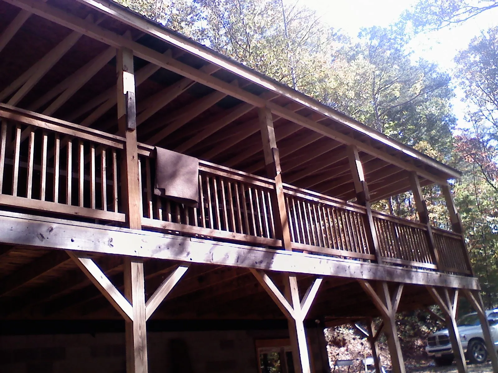 Timber framing under a new elevated porch and deck — Roof Leak Repair in Greeley by Roofing Brothers